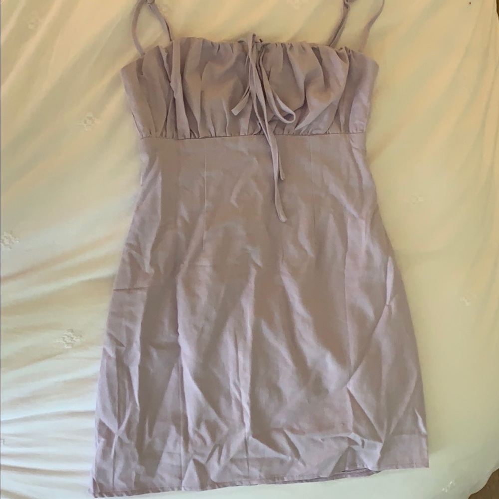 Violet dress with puffer top.